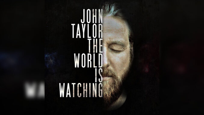 JOHN TAYLOR 'The World Is Watching' - Cover Photo