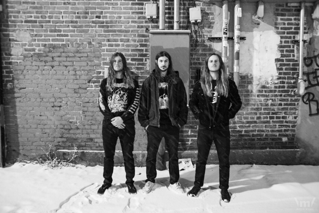 THE MUNSENS: Decibel Magazine Premieres âSacred Ivoryâ Single From Denver Blackened Doom Trio Ahead Of Its Release This Friday The 13th