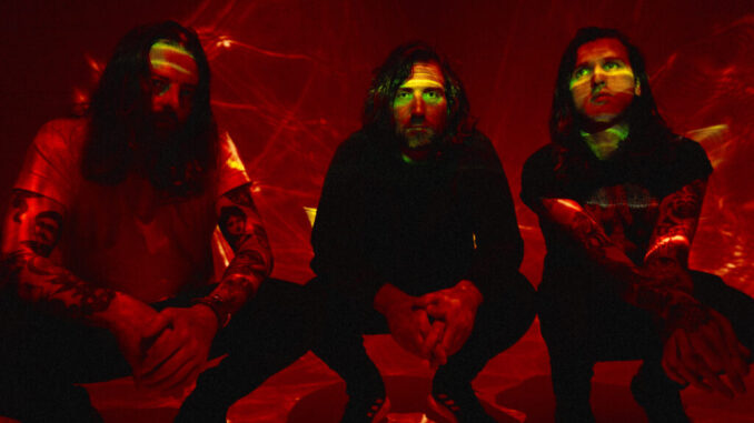 TAYNE: Industrial Noise Pop Trio To Release Debut Album Love On January 31st, 2025 Via Inside Job/MNRK; New Video/Single âFear,â A Collab With UK Mathcore Heroes Rolo Tomassi, Now Playing