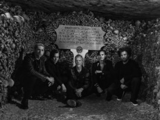 QUEENS OF THE STONE AGE: ALIVE IN THE CATACOMBS TO BE UNEARTHED JUNE 5