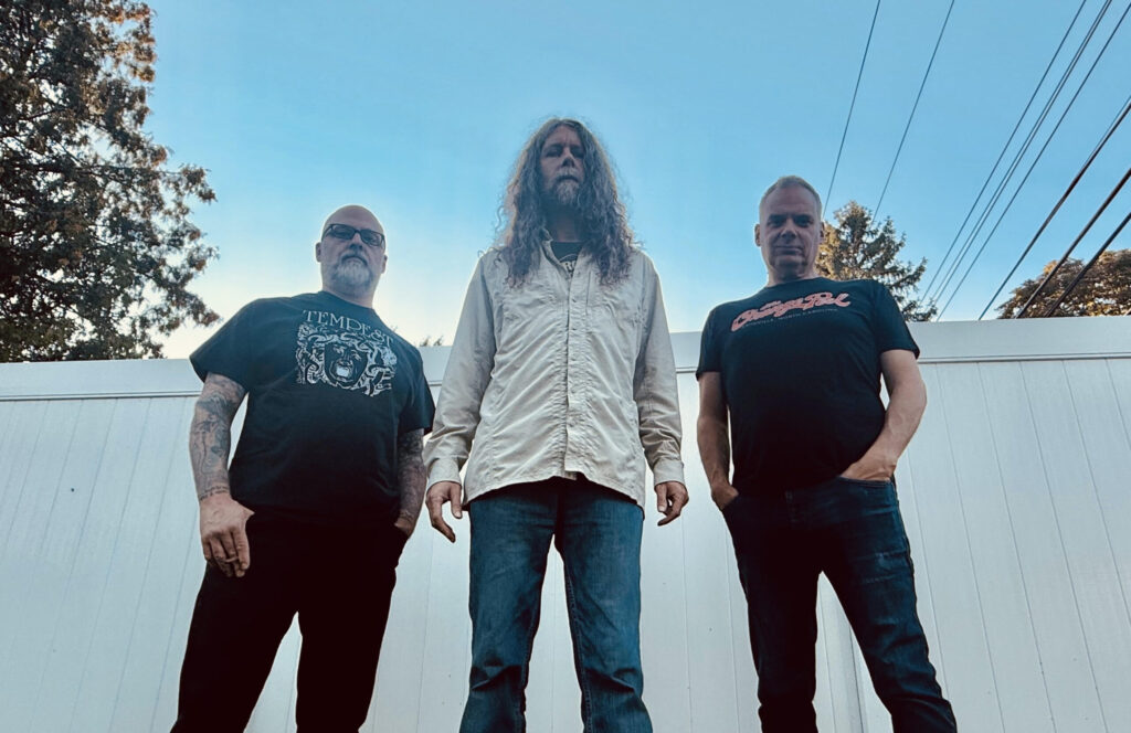 WINDS OF NEPTUNE: Decibel Magazine Premieres Self-Titled Debut From Detroit Rock Trio Featuring Current/Former Members Of Flogging Molly, The Meatmen, 500 Ft. Of Pipe, More; LP To Drop Friday On Small Stone Recordings