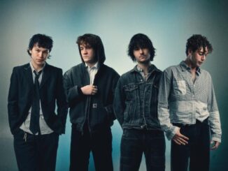 Quarters of Change official Elektra press photo — credit Amyas Ryan