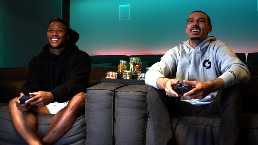 Saquon Barkley and GoodGameBro playing Madden NFL 22 during Xbox Sessions