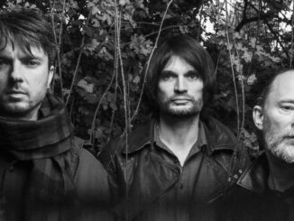 The Smile – Thom Yorke, Jonny Greenwood and Tom Skinner, 2022 publicity photo by Alex Lake