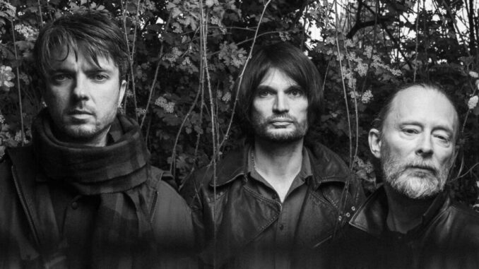 The Smile – Thom Yorke, Jonny Greenwood and Tom Skinner, 2022 publicity photo by Alex Lake